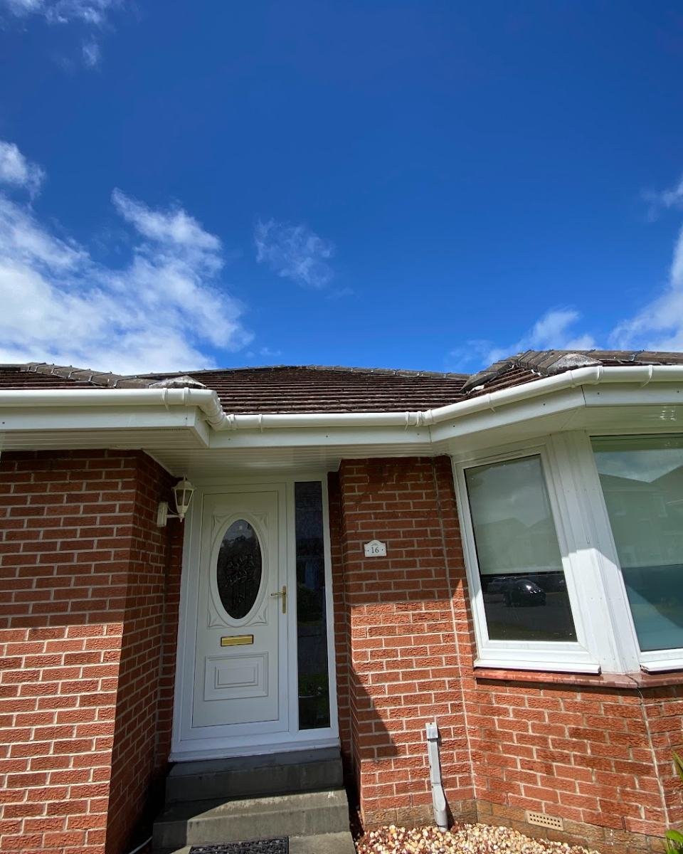 Clean white gutter and fascia after clearing
