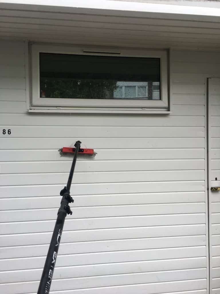 uPVC being washed down with a water-fed pole
